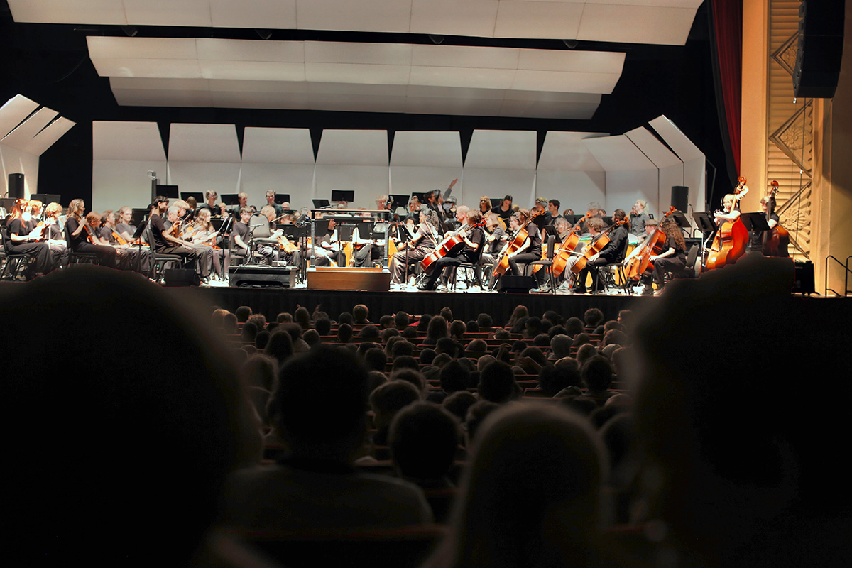 Buncombe County 5th graders watching Asheville Symphony Orchestra’s Young People’s Concert at Harrah’s Cherokee Center Asheville during the Asheville Amadeus festival. Support in part by ArtsAVL Arts Build Community grant. Photo by Mike Morel courtesy of Asheville Symphony.
