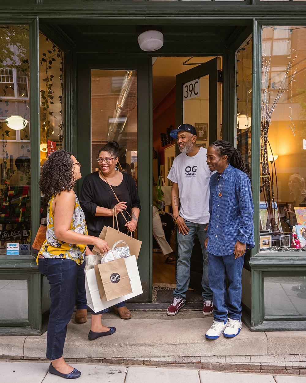 photo courtesy of the Asheville Downtown Association Shoppers downtown, photo courtesy of the Asheville Downtown Association