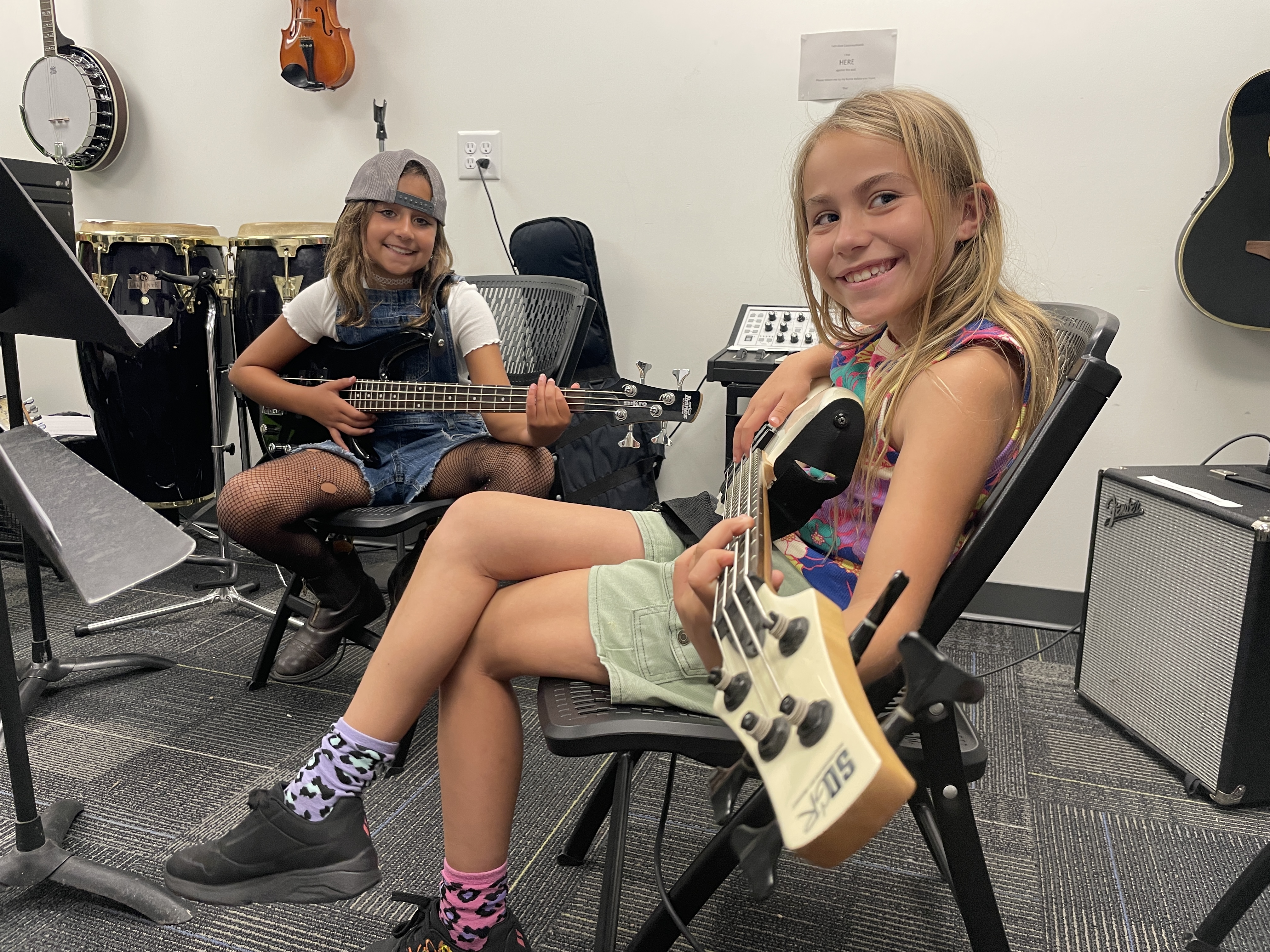 Girls playing guitars at Asheville Music School Rock Camp
